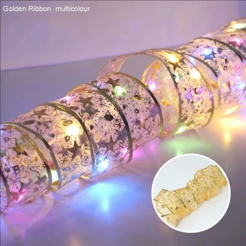 Blue Artificial Flowers Christmas Tree Decoration: Glitter Star Light, Berries, Snowflakes and Bow.